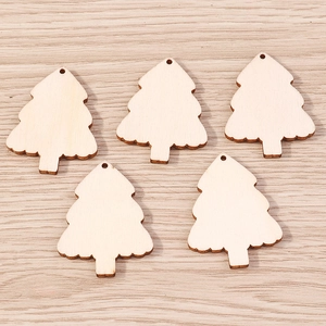 Detailed view of unfinished Christmas tree wood pendants for DIY crafts and jewelry making