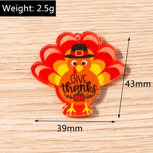 Detailed view of acrylic Thanksgiving turkey charm with Give Thanks text and dimensions