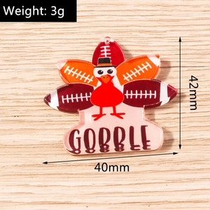Detail view of 40mm turkey acrylic charms with weight and size measurements
