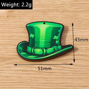 Detail view of 51mm green St. Patrick's Day wood charm showing clover pattern and size info