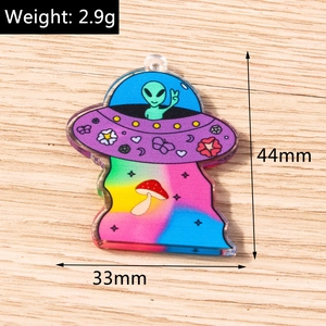 Detail of alien spaceship acrylic pendant with dimensions 44mm height and 33mm width