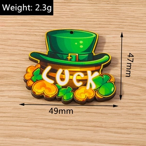Detail showing St. Patrick's Day clover hat pendant with Luck text and 49mm size
