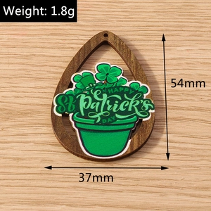 Macro view of St. Patrick's Day wood pendant with lucky shamrock and green pot motif