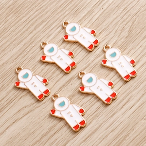 Set of 6 astronaut enamel alloy pendants with gold trim for DIY jewelry making
