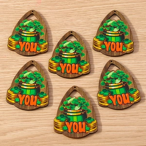 Detail of wooden teardrop pendants with St. Patrick's clover and pot of gold prints