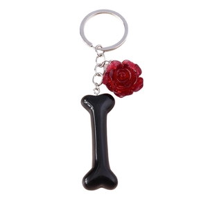 Creative rose flower and black bone keychain with silver metal ring and resin charm