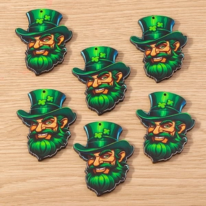 Macro view of St. Patrick's Day leprechaun acrylic charms with shamrock hat details