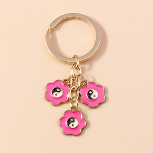Portachiavi fiore Tai Chi Yin Yang in lega dorata e smalto rosa stile cinese