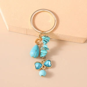 Bohemian turtle style key ring with blue turquoise stones and golden heart bow charm