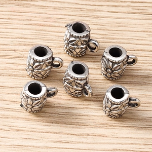 Macro shot of vintage zinc alloy flower patterned cup beads for DIY jewelry making