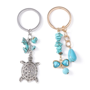 Ethnic style hollow turtle keychain with irregular turquoise stones on a silver-tone ring