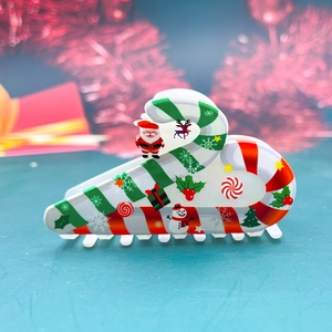 Pince à cheveux de Noël en forme de sucre d'orge avec motifs bonhomme de neige