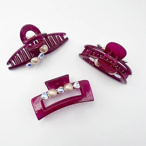 Three-piece purple pearl and rhinestone claw clip set in polished acrylic for women