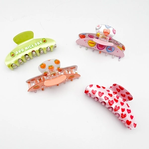 Four colorful acrylic claw clips with sweet fruit and heart prints for women hairstyles