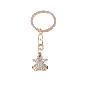 Charming gold-plated frog keychain with sparkling white rhinestones and purple crystal eyes