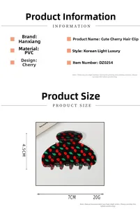 Vue détaillée de la pince à cheveux en PVC noir à motif cerise et ses dimensions