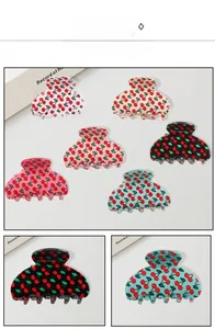 Détails de six pinces à cheveux colorées à imprimé cerise en matière acétate