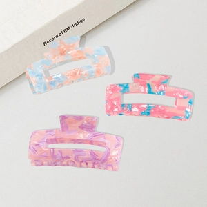 Elegant square acetate hair claws in marble patterns including blue orange and pink