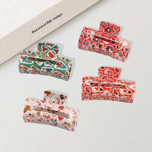 Set of four Christmas themed large hair claws with snowman and reindeer patterns
