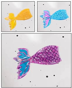 Detailed view of mermaid tail hair claws in acetate with delicate scales texture
