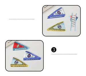 Detailed view of triangular PVC hair claws with evil eye patterns in various colors