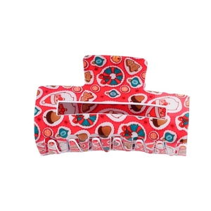 Christmas theme hair claw clip with colorful holiday patterns in red acetate finish