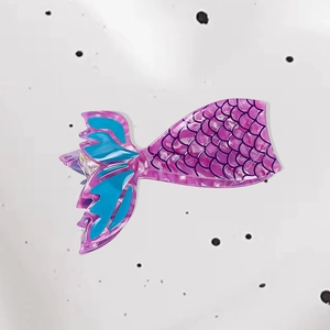 Elegant acetate mermaid tail hair claw clip in translucent purple with scale patterns