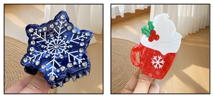 Detail view of festive acetate hair claws with snowflake pattern and coffee cup design
