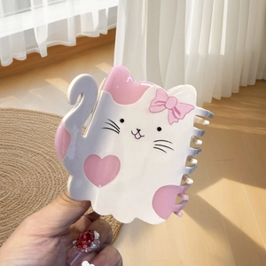 Pince à cheveux chat crème en acétate avec détails de cœur rose et larges dents de peigne