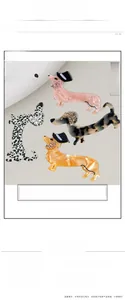 Detail of dog-shaped acetate hair clips in pink, tortoiseshell, and polka dot patterns