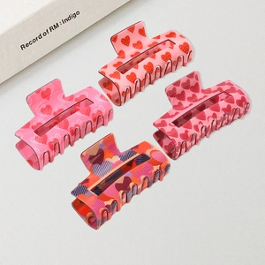 Set of 4 square hair claws with colorful heart patterns and hollow minimalist design