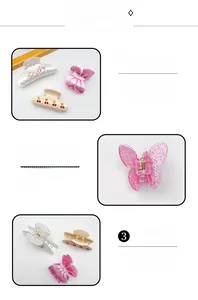 Détail d'une pince à cheveux cerise et de clips en résine avec lettrage baby