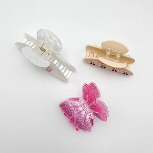 Pinces à cheveux vintage cerise et strass pour chignons français élégants