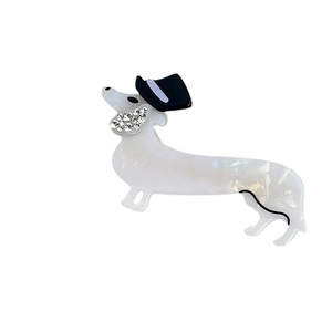 Cute dachshund-shaped acetate hair clip with pearl white finish and rhinestone accents