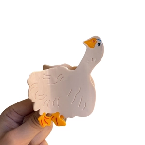 Pince à cheveux réaliste en forme d'oie en acétate avec corps blanc et bec orange pour femme