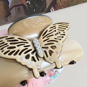 Pince à cheveux papillon en acétate écaille de tortue avec strass brillants pour femmes