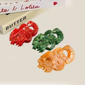 New Chinese style dragon hair claws in red, green and amber acetate with golden details
