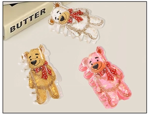 Trois pinces à cheveux ours en acétate blanc marron et rose avec finition brillante