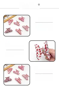 Détail des pinces à cheveux en acrylique avec motifs de lèvres rouges et cœurs romantiques