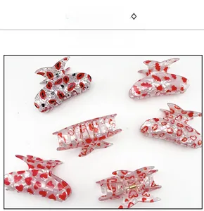 Détails des pinces à cheveux en acrylique avec motifs lèvres rouges et cœurs