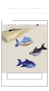 Detailed view of dolphin hair claws in blue and purple acetate for stylish hairstyles