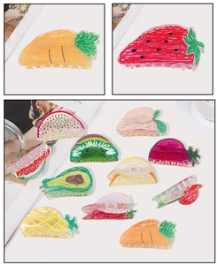 Close-up of hand-painted fruit pattern acrylic hair claws in assorted colorful styles