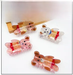 Détails des pinces à cheveux ours irisées en marron, beige, rose et orange vif