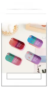 Detail of 4pcs glitter gradient hair claws featuring Chill Pill and bow designs