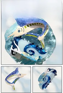 Detail view of the acetate tuna fish hair claw with ocean-inspired blue and white textures