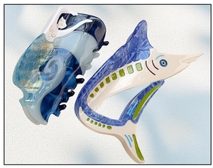 Detail of mermaid and swordfish hair claws made of high-quality acetate material