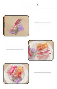 Detailed macro view of acetate dinosaur hair claw clips with strong spring and sparkling finish
