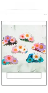Set of six large PVC hair claws with colorful daisy prints and wavy cloud edges
