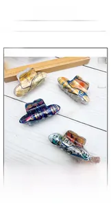 Detailed set of four large acrylic hair clips with artistic sunset and landscape prints