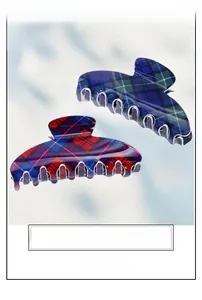Detail view of large red and blue plaid hair claw clips in Korean luxury style